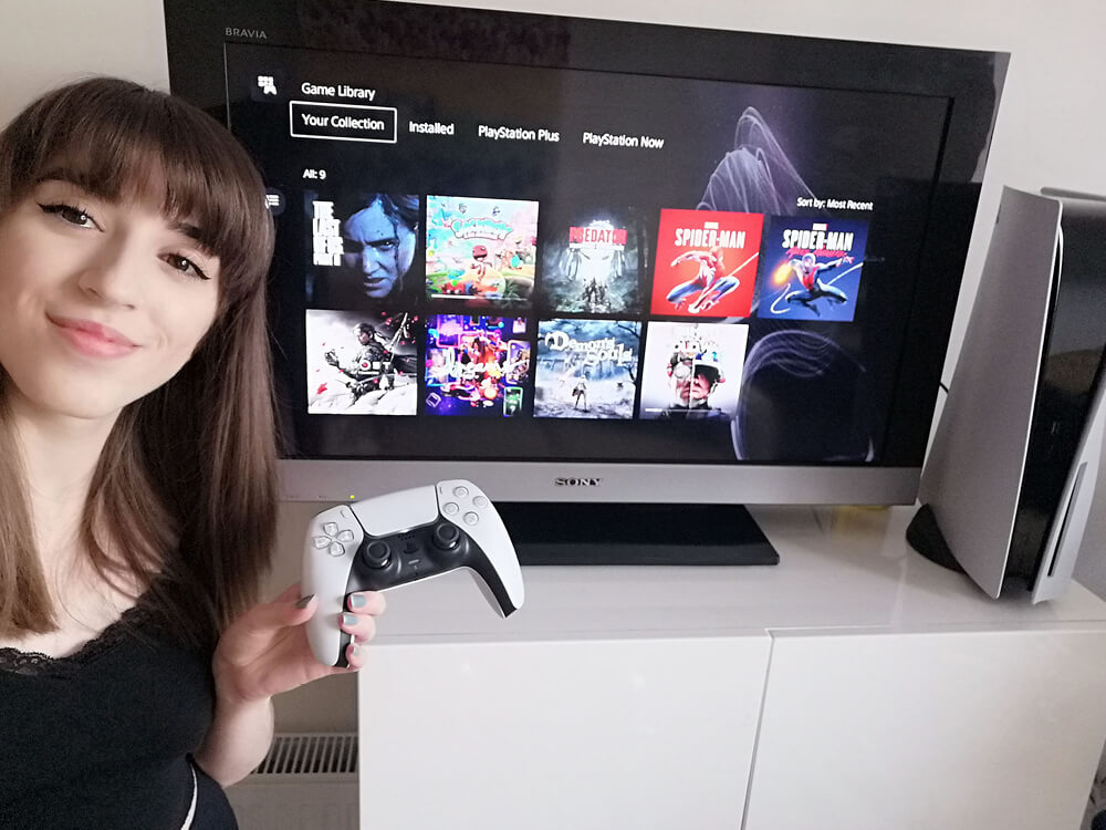 Image of brown haired student holding ps5 controller