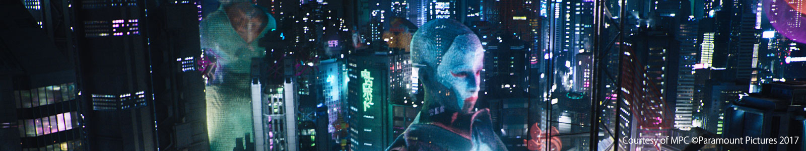On a futuristic scene, the head of a humanoid robot is seen on a backdrop of a city's skyscrapers at night