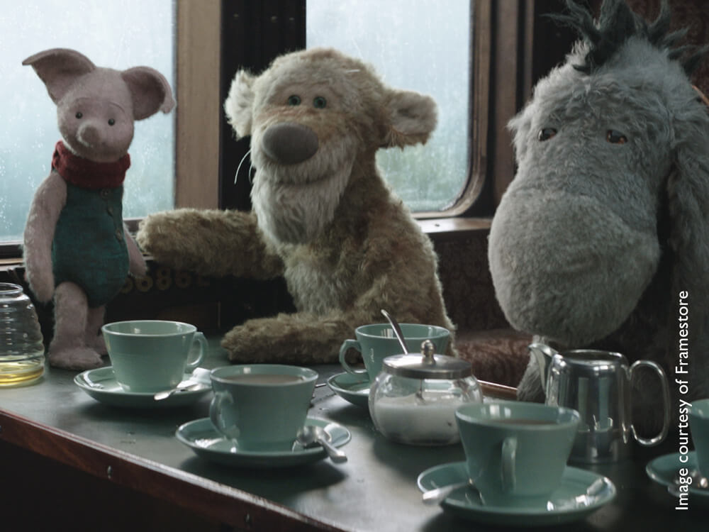 Animated animals having tea